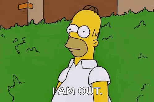 Homer Simpson slowly disappearing into a hedge